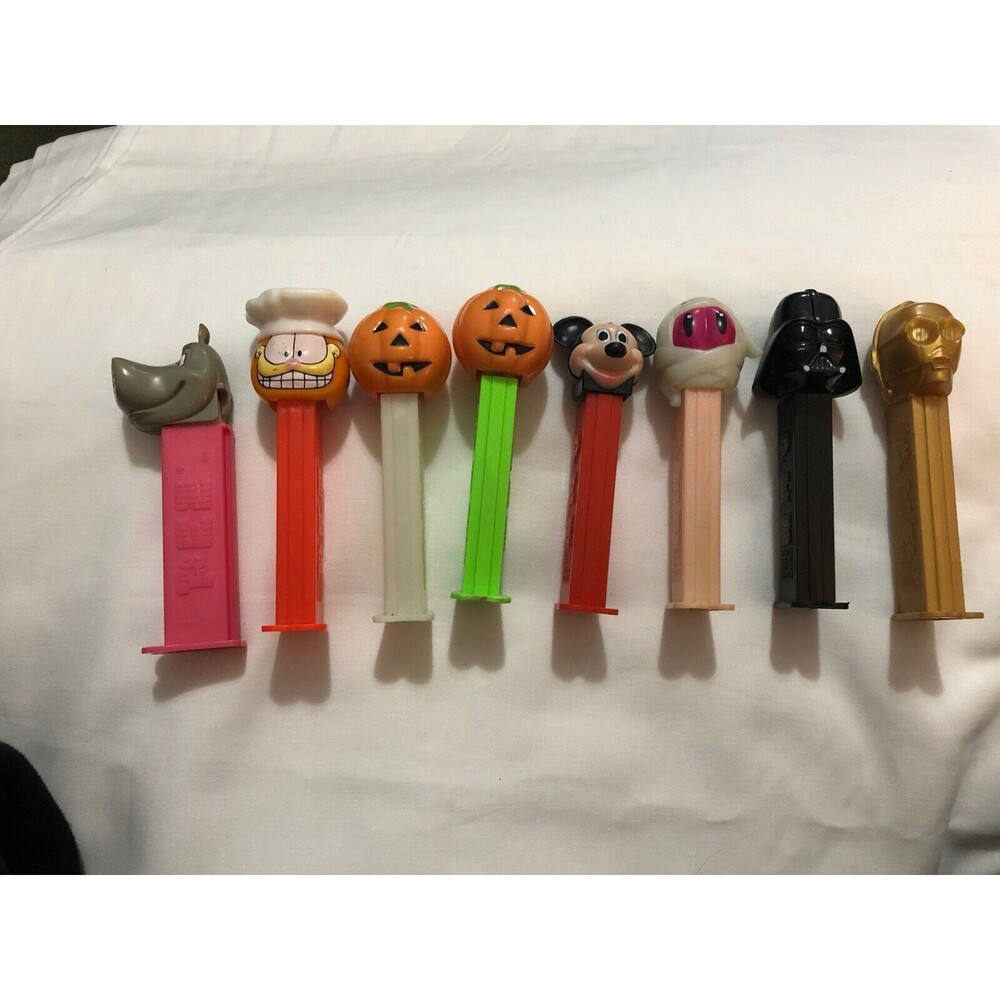 8 Various Vintage Collectible Pez Dispensers